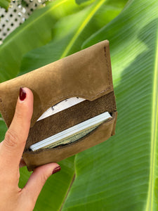 Olive green  small bifold handcrafted wallet. Each side holds 10 cards. We love putting folded bills on one side and cards on the other.