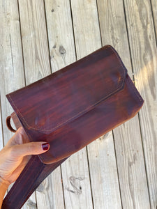 Hand-painted Mahogany handmade genuine leather fanny pack (hipsack), can be used as a cross-body bag. Hand-crafted in Puerto Rico. Oduardo is a husband and wife leather goods handmade small-batch fair trade shop. We make all our products by hand. In our shop you can find convertible messenger bags, leather backpacks, leather briefcases, leather cross-body bags, leather passport covers, leather wallets, leather bifold wallets, and more!