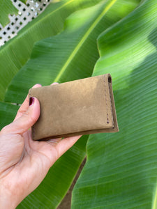Olive Green small bifold handcrafted wallet. Each side holds 10 cards. We love putting folded bills on one side and cards on the other.