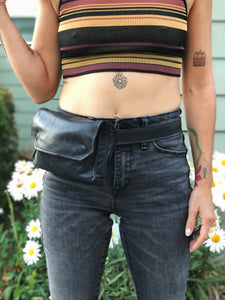 Black handmade genuine leather fanny pack (hipsack), can be used as a cross-body bag. Hand-crafted in Puerto Rico. Oduardo is a husband and wife leather goods handmade small-batch fair trade shop. We make all our products by hand. In our shop you can find convertible messenger bags, leather backpacks, leather briefcases, leather cross-body bags, leather passport covers, leather wallets, leather bifold wallets, and more!